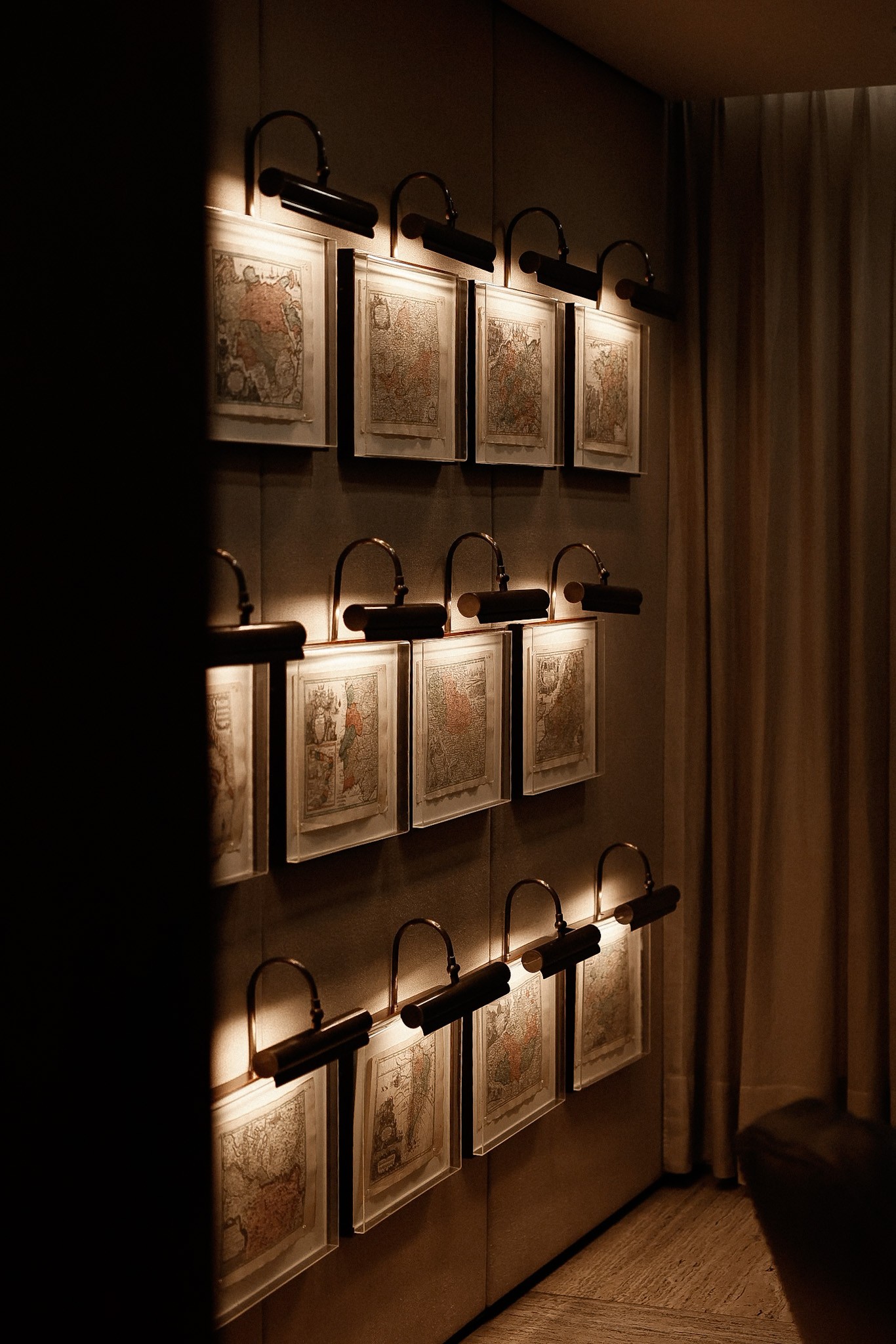 Hotel Fasano São Paulo lobby — gallery wall and antique maps